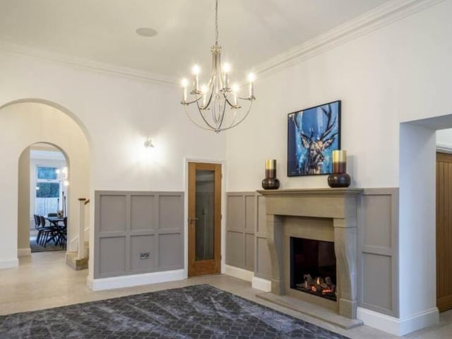 This incredible home is nestled at the forefront of an exclusive residential development.