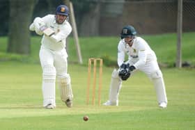 Jack Hughes hit a half century in vain as Townville lost out to Bradford Premier League leaders Woodlands.