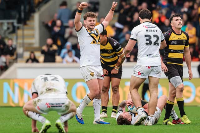Castleford Tigers' George Lawler celebrates the win at York Knights. Picture by Alex Whitehead/SWpix.com