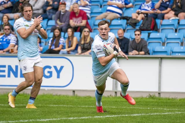 Jack Broadbent charges over for a try for Featherstone Rovers at Halifax. Picture: Dec Hayes