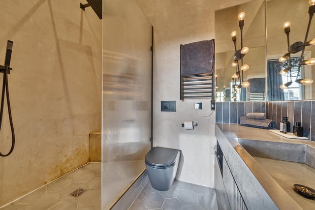 Shower in style, in this sizeable facility.