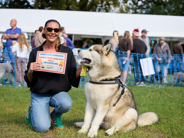 Kirsty Burgess and Bruce who won 'the fluffiest dog' category.