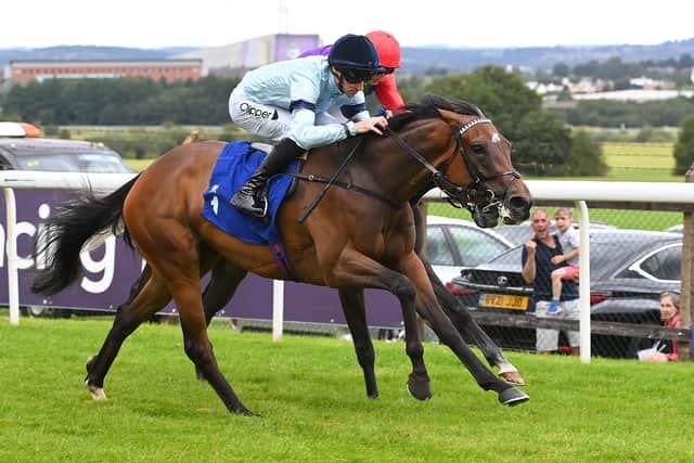 Believing, ridden by Danny Tudhope, got up to win Pontefract's most prestigious race of the year, the £60,000 EBF Stallions Highfield Farm Flying Fillies’ Stakes. Photo by Alan Wright