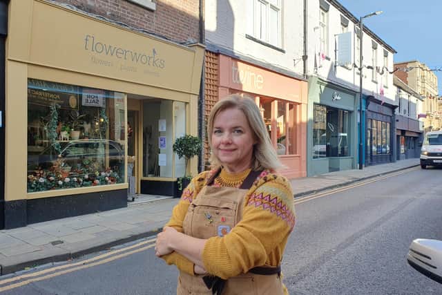Liz Abbott outside Flowerworks on Ropergate