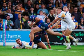 Isaiah Vagana scores Wakefield Trinity's opening try in their loss to Leeds Rhinos. Picture by Alex Whitehead/SWpix.com.
