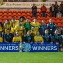 The triumphant Emley team celebrate winning the Sheffield & Hallamshire Senior Cup final. Picture: Mark Parsons