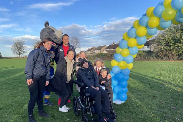 Rob Burrow and guests including his old Leeds Rhinos team-mate Kevin Sinfield attended the last mile of the charity walk by youngsters and staff from Orchard Head Junior, Infant and Nursery School, Pontefract.