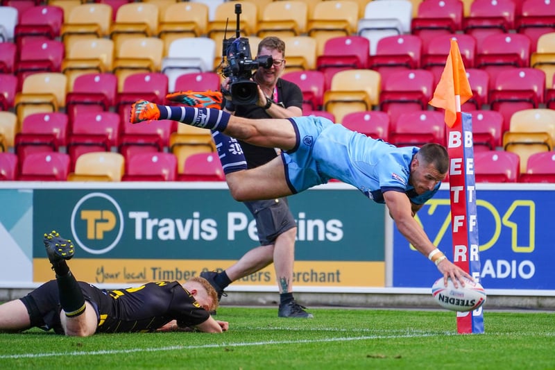 Gareth Gale spectacularly dives over for one of his four tries.