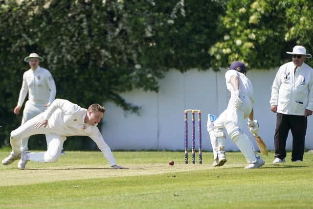 This Ossett batsman makes his ground after Harry Clewett fields off his own bowling.