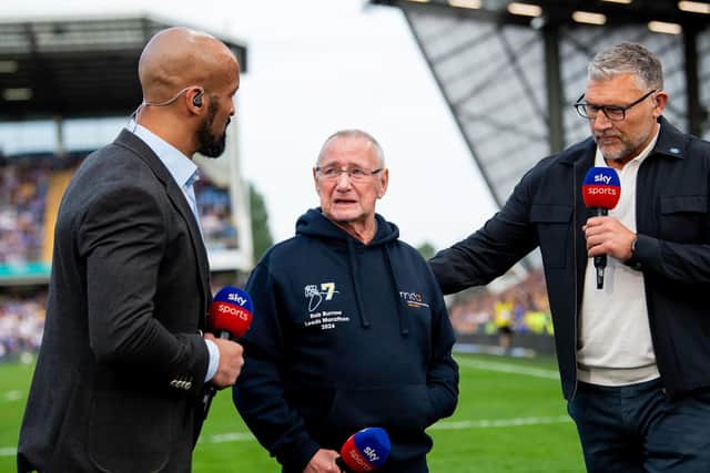 Geoff Burrow with Jamie Jones-Buchanan, left and Barrie McDermott who are both former Leeds Rhinos teammates of his son Rob Burrow. Picture by Allan McKenzie/SWpix.com.