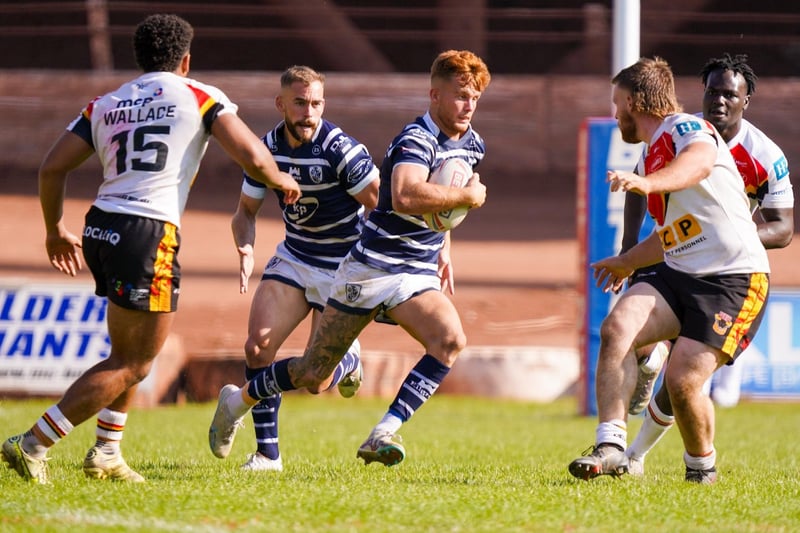 Ellis Longstaff charges into attack for Featherstone Rovers.