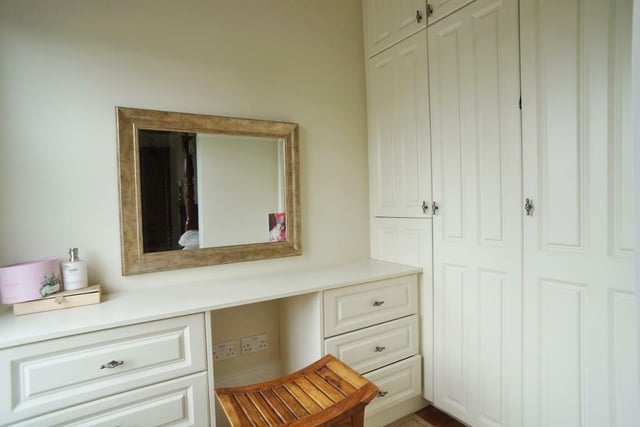 This room has a window to the front, dressing table and fitted robes together with stripped timber flooring with deep coving.