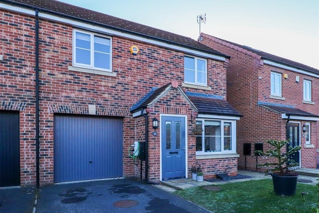 The approach to the semi-detached home for sale in South Milford.