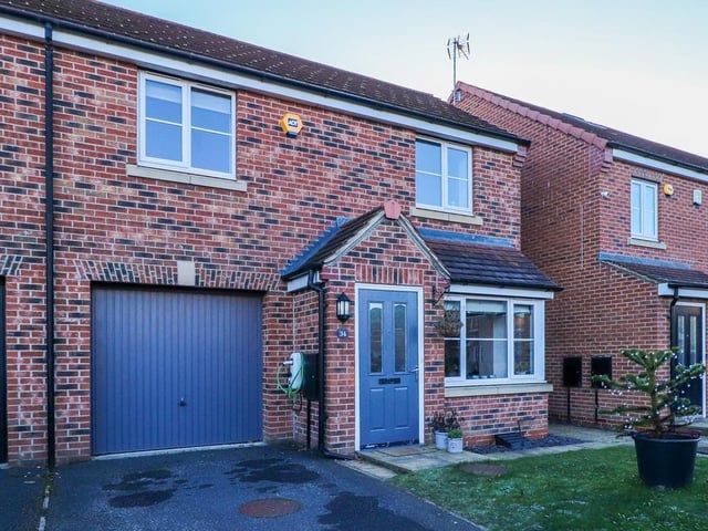 The approach to the semi-detached home for sale in South Milford.