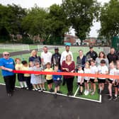 Councillor Michelle Collins cuts the ribbon at the courts at Haw Hill Park.