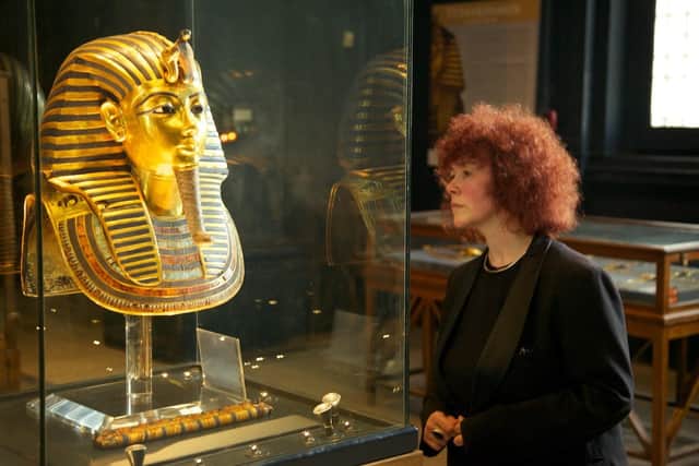 Prof Joann Fletcher up close with the real golden death mask in Cairo