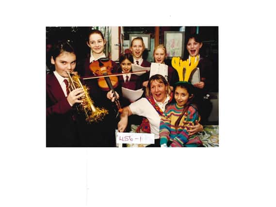Cathedral School students sing carols to patients on childrens wards at Pinderfields Hospital. Published in the Wakefield Express 29.12.1995