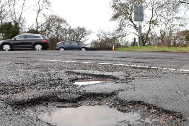 The Tories say they want extra money to be dedicated to the fixing of potholes.
