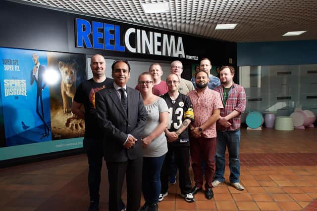 Muhammad Faisal with members of the management team at Reel Cinema, which opened in Wakefield today.