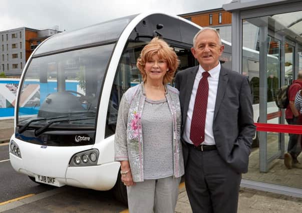Coun Denise Jeffery and Coun Keith Wakefield with one of the new buses.