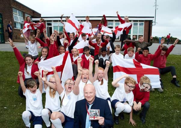 EXCITED: Paul Tattersfield wrote the unofficial World Cup single, which was sung  by almost 400 students, including his Year 6 class.