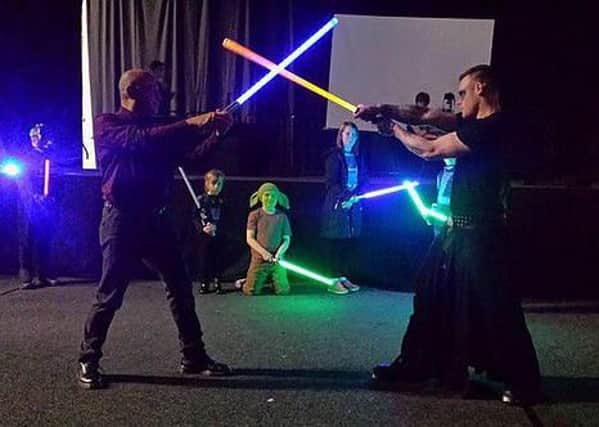 family fun: Lightsaber training classes at last years event.