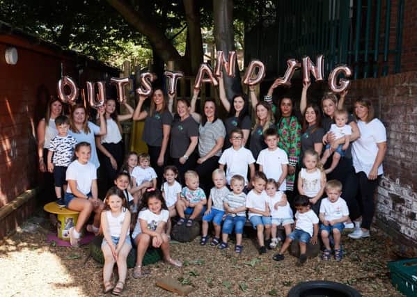 Toybox Nursery in Wakefield has been given outstanding Ofsted report. Pictured are staff and past and present children from the nursery