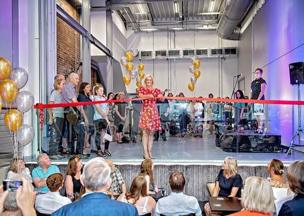 ITV Calendar journalist Sally Simpson cutting the ribbon at Wakefield Theatre Royal's new Centre for Creativity. Picture: ROBLING PHOTOGRAPHY.