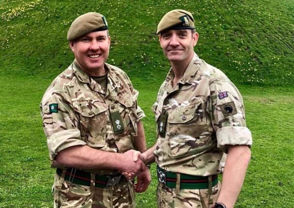 LEADER: Commanding officer of the 4th Battalion Lt Col Greg Murphy, left, with his predecessor Lt Col Mark Yates in April 2018.