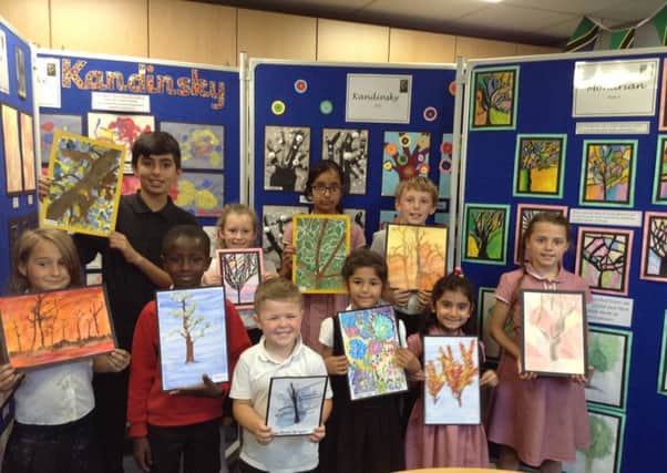 WINNERS: Pupils from St Marys CE Primary School with their artwork.