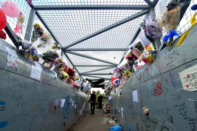 Tributes left at the bridge following Spencer's death.