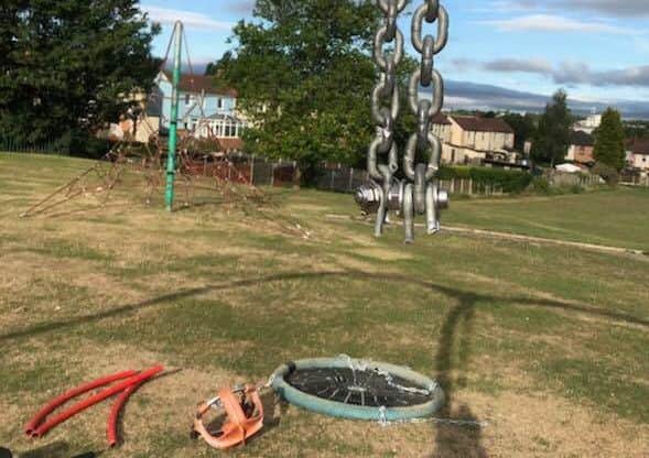 The swings were cut from their chains.