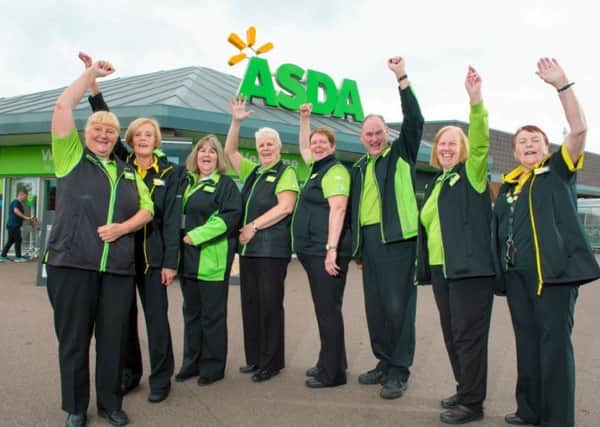 LOYAL BUNCH: Staff at Asda Wakefield in Durkar have clocked up 705 years of combined experience.