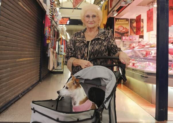 Diane Buckley and her dog Kizzy at Castleford Indoor Market