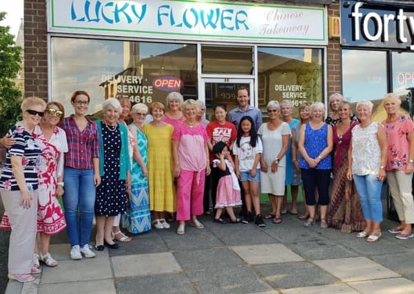Singers show solidarity with local takeaway after break-in