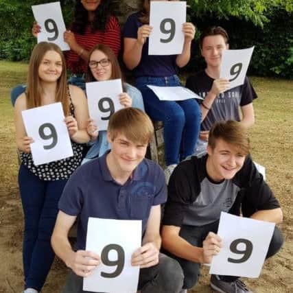 Thisuri Perera, Megan Green, Kayleigh Willoughby, Demi Moore, Jack Purchon, Henry Cobb and Toby Hill celebrate their top grades.