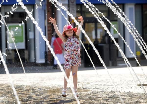 Hettie O'Keefe, aged 5, from Ossett enjoyed playing in the fountain in the sun earlier this year.