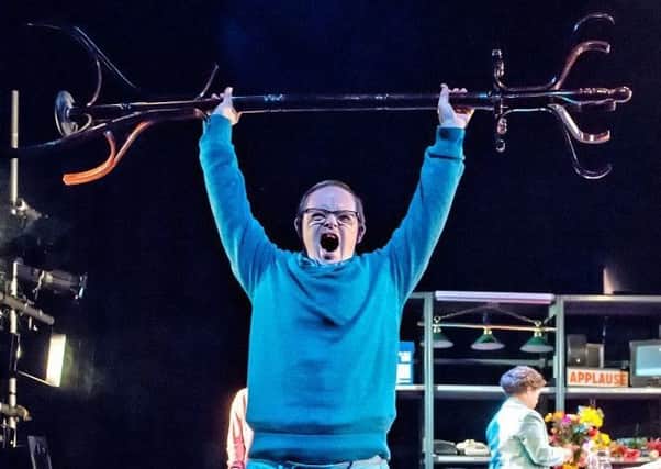 ROLE: Actor Paul Wilson relives his powerlifting days during a performance of You Have Been Watching. Picture: Ant Robling.