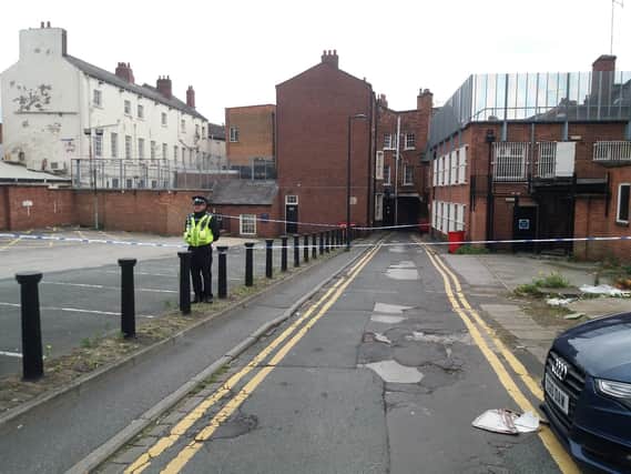 Police were investigating a scene at Thompsons Yard off Westgate in Wakefield city centre.