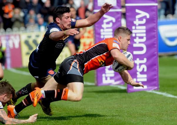 Ryan Hampshire scores a try during his year on loan at Castleford Tigers. He is set to play against them for Wakefield Trinity.