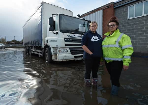 Staff at Kenneth Howley Transport say that the flood could have been avoided if Yorkshire Water had turned on the pumps. Pictured: Abbie Tapley and Elizabeth Howley.