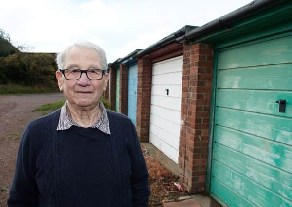Robert Mann had to move fridges dumped outside his garage for nearly two months.