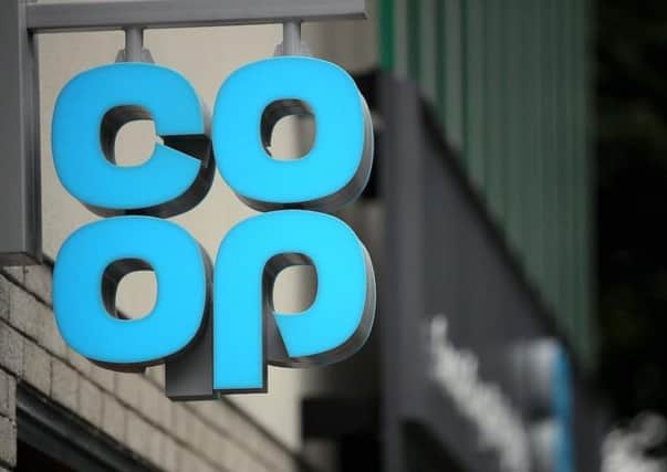 The Co-op has complained to the government because a decision on whether or not to approve their plans for a new store is still pending.