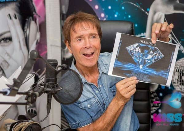 Congratulations: Sir Cliff on hearing news of the single.