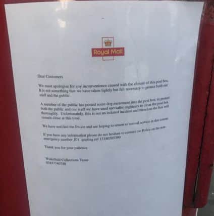 The letter has been attached to the outside of the post box.