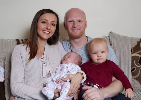 Ami Dimmack and her partner Dale Hemingway delivered their second daughter, Priya, at home by themselves  after she went into labour unexpectedly. Pictured with Payton