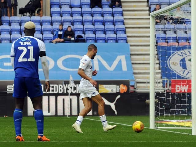 Kemar Roofe walks the ball into the net for the winning goal for Leeds United at Wigan. Picture: Simon Hulme