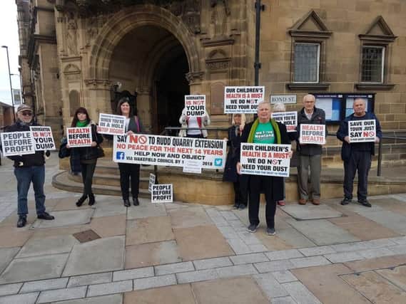 Campaigners demonstrate outside County Hall.