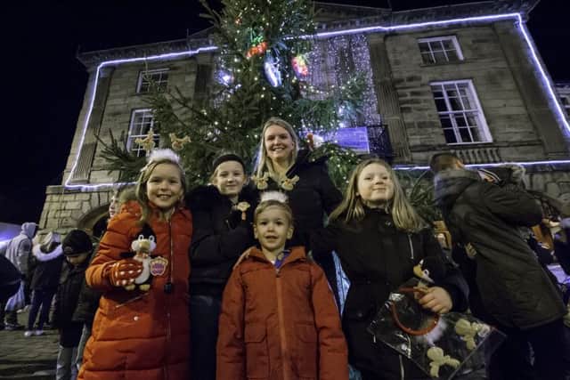 Isobel Walker, Chloe Harris, Alice Walker, William Walker & Mia Harris in front of the Pontefract Christmas tree.