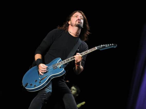 Dave Grohl on stage with the Foo Fighters on his previous appearance at the Leeds Festival.